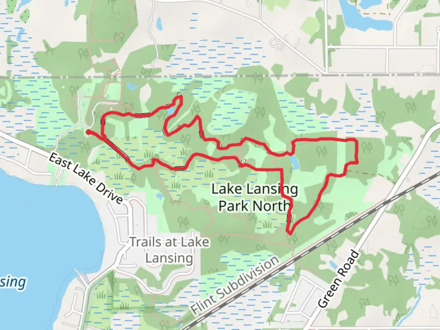 An image depicting the trail Lake Lansing Park North Loop and its surrounding area.