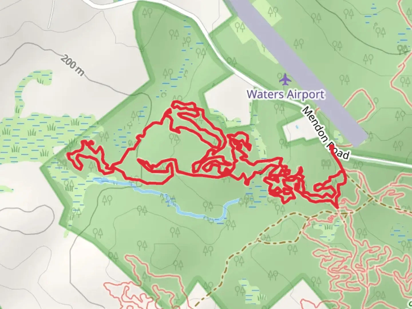 An image depicting the trail Par 5 Loop from Mendon Road and its surrounding area.
