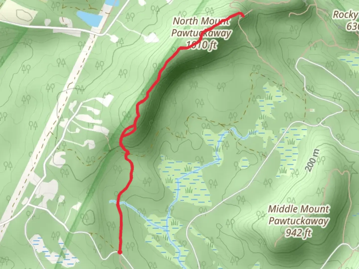 An image depicting the trail North Mount Pawtuckaway Trail and its surrounding area.