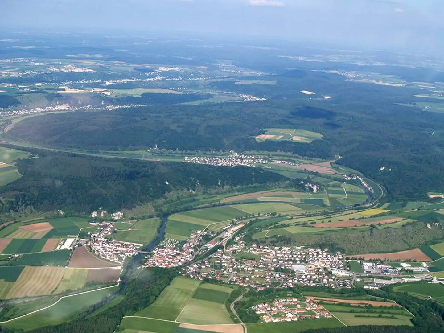 An image depicting the trail Urdonautalsteig and its surrounding area.