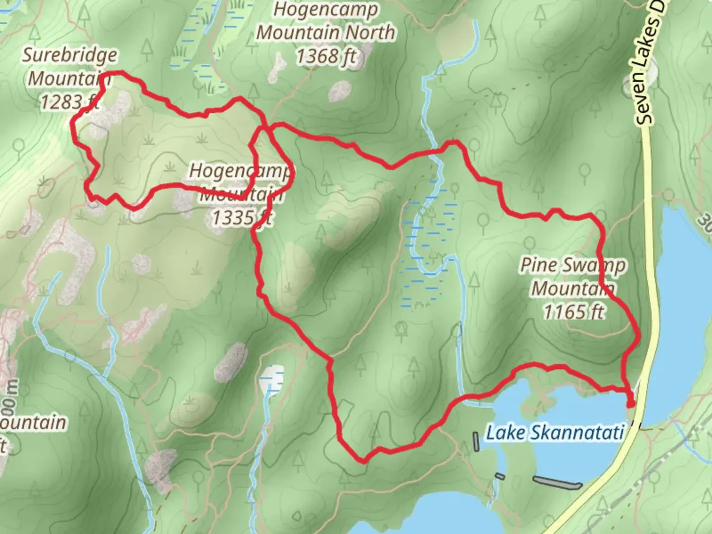 An image depicting the trail Hogencamp Mountain from Skannatati Lake and its surrounding area.