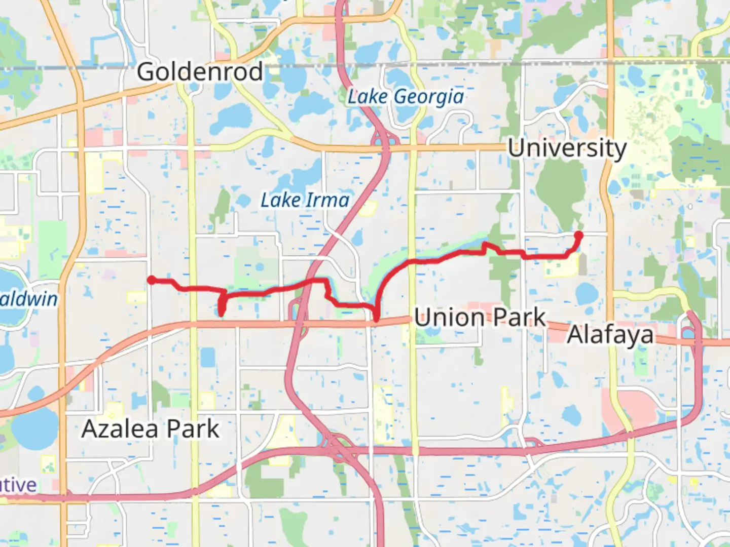 An image depicting the trail Goldenrod Canal and Hickory Cove Park via Little Econ Greenway and its surrounding area.