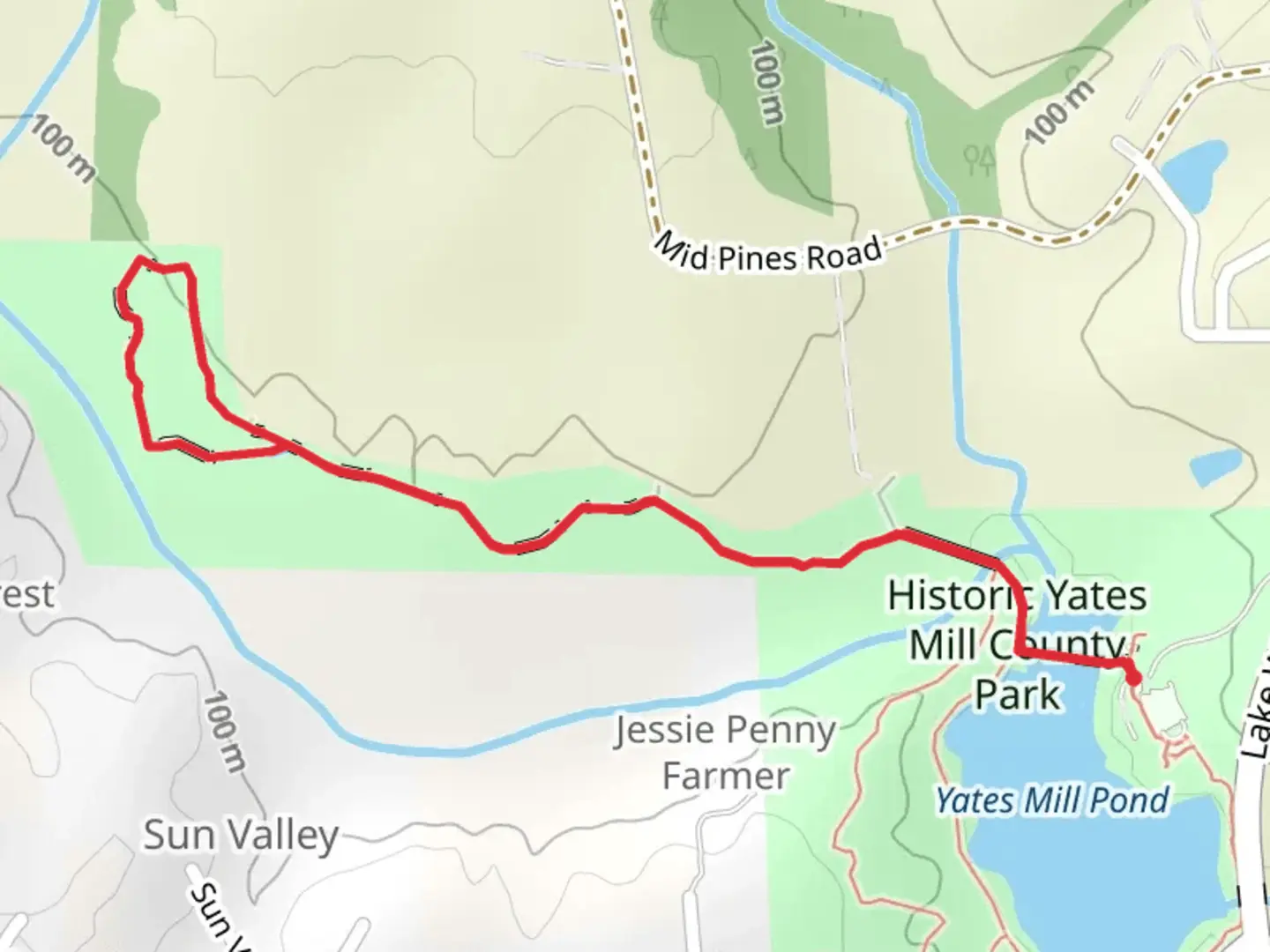 An image depicting the trail Creekside Trail from Yates Mill Pond and its surrounding area.