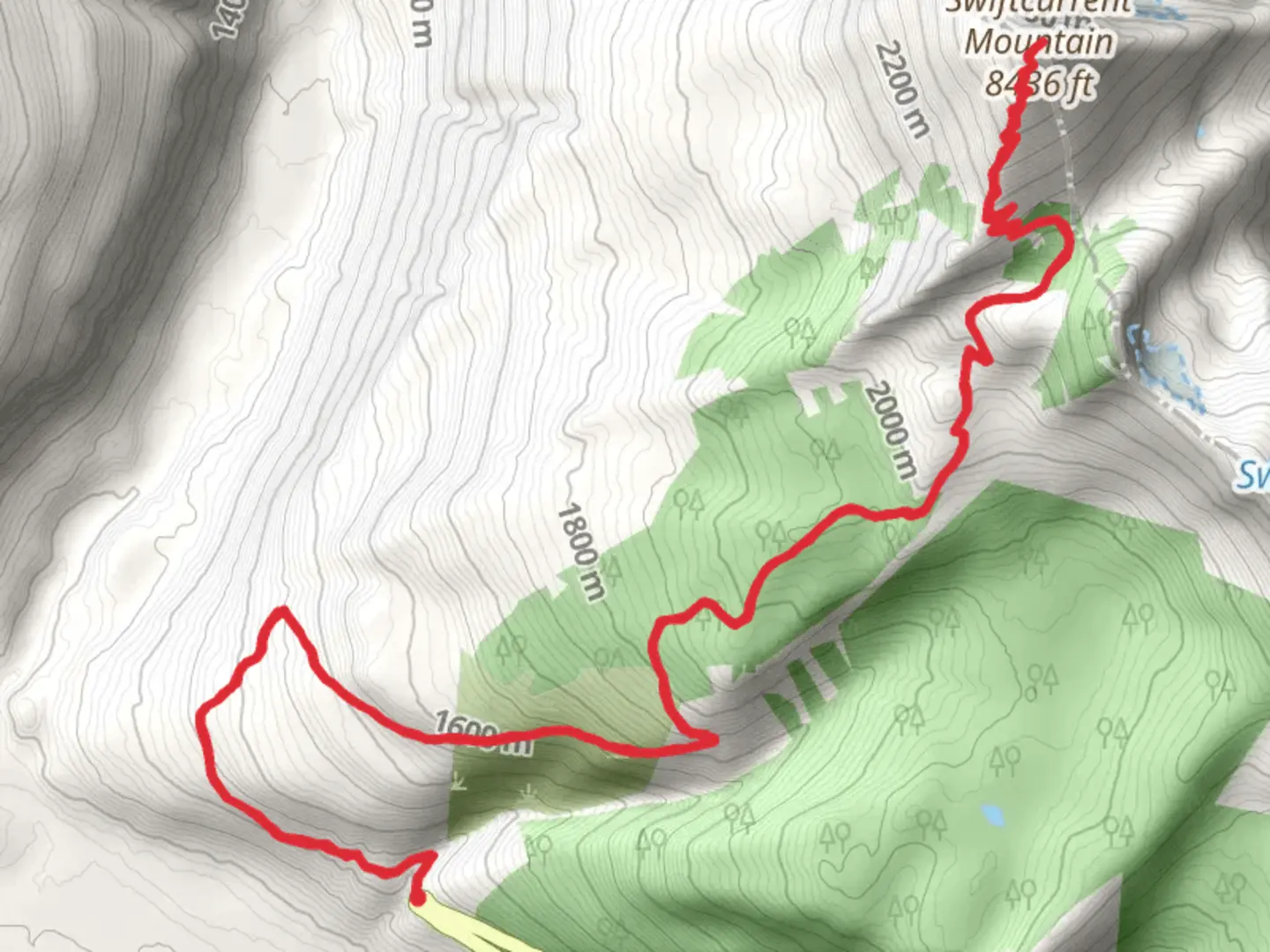 An image depicting the trail Swiftcurrent Mountain via Granite Park Trail and its surrounding area.