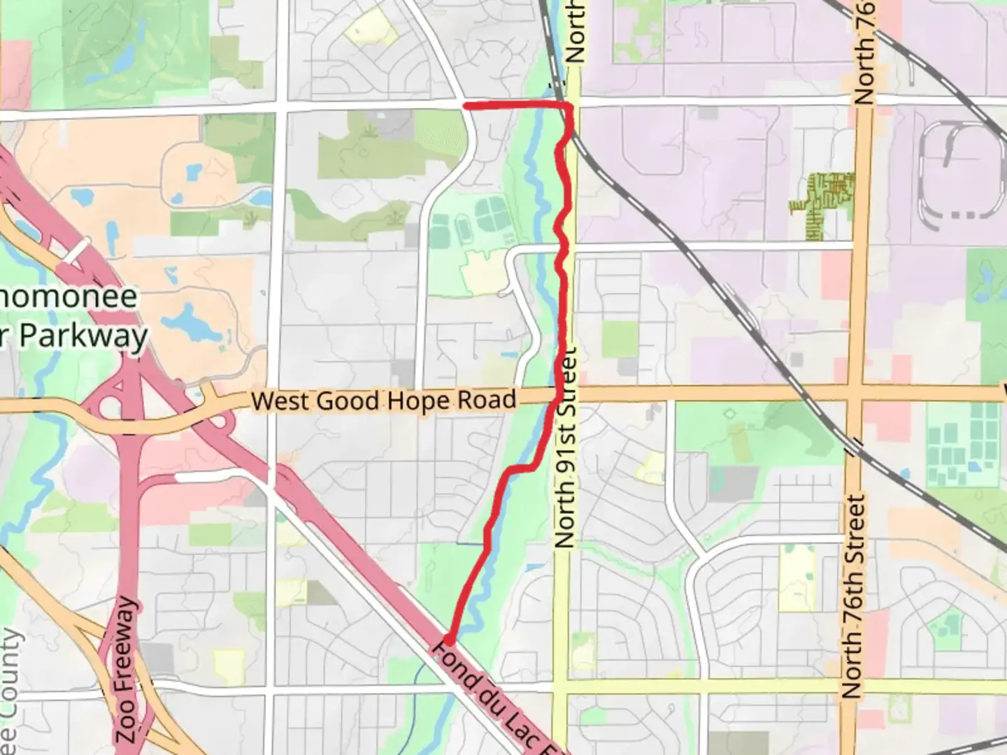 An image depicting the trail Walk along Little Menomonee River from West Leon Terrace and its surrounding area.