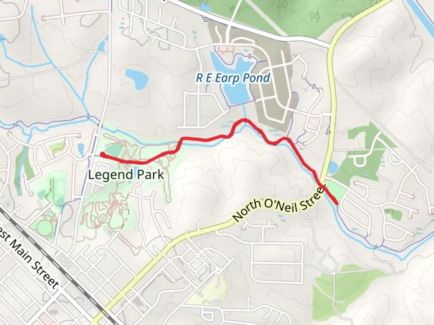 An image depicting the trail Sam's Branch Greenway Trail - Legend Park and its surrounding area.