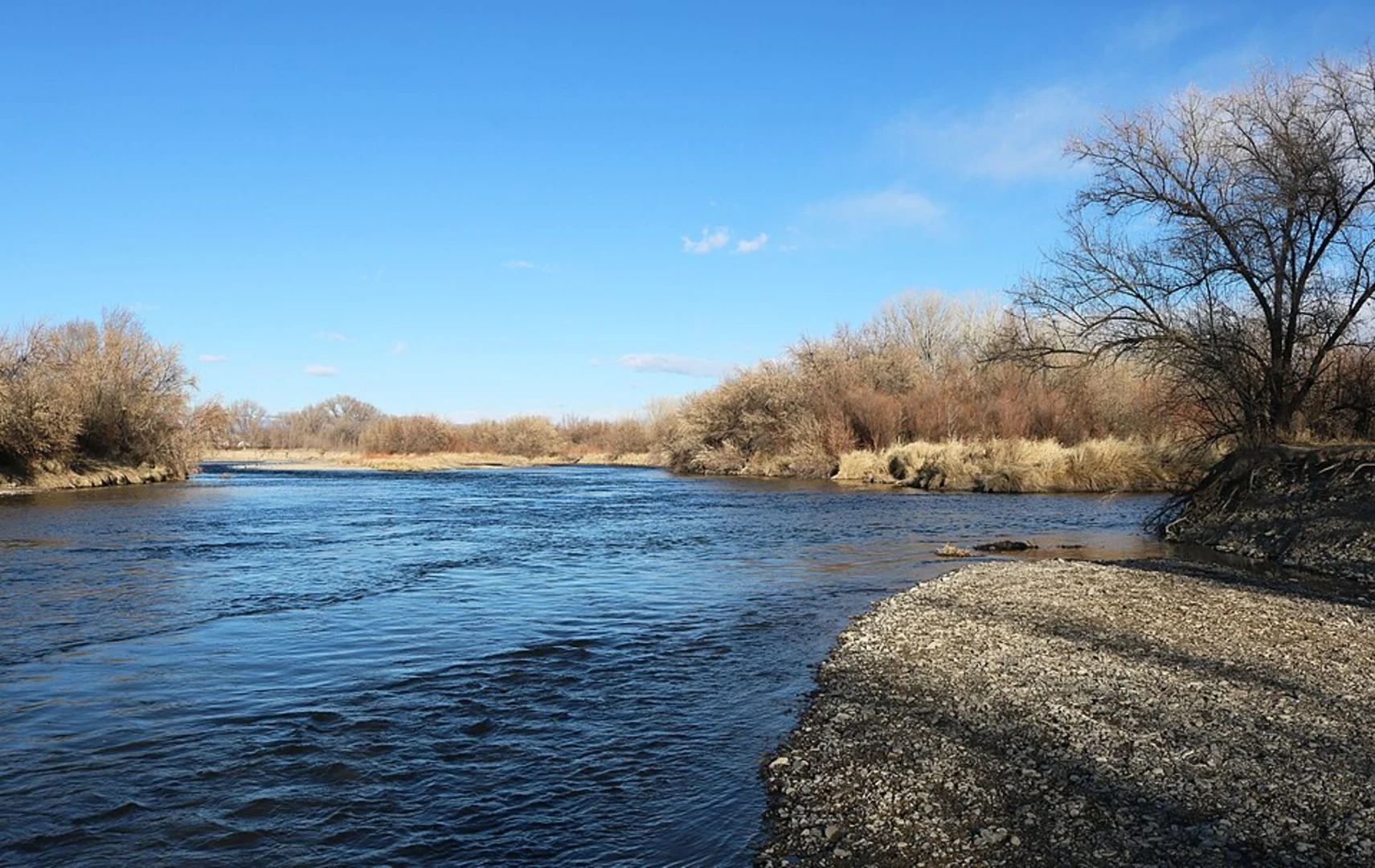 An image depicting the trail Confluence Lake and Gunnison River Loop and its surrounding area.