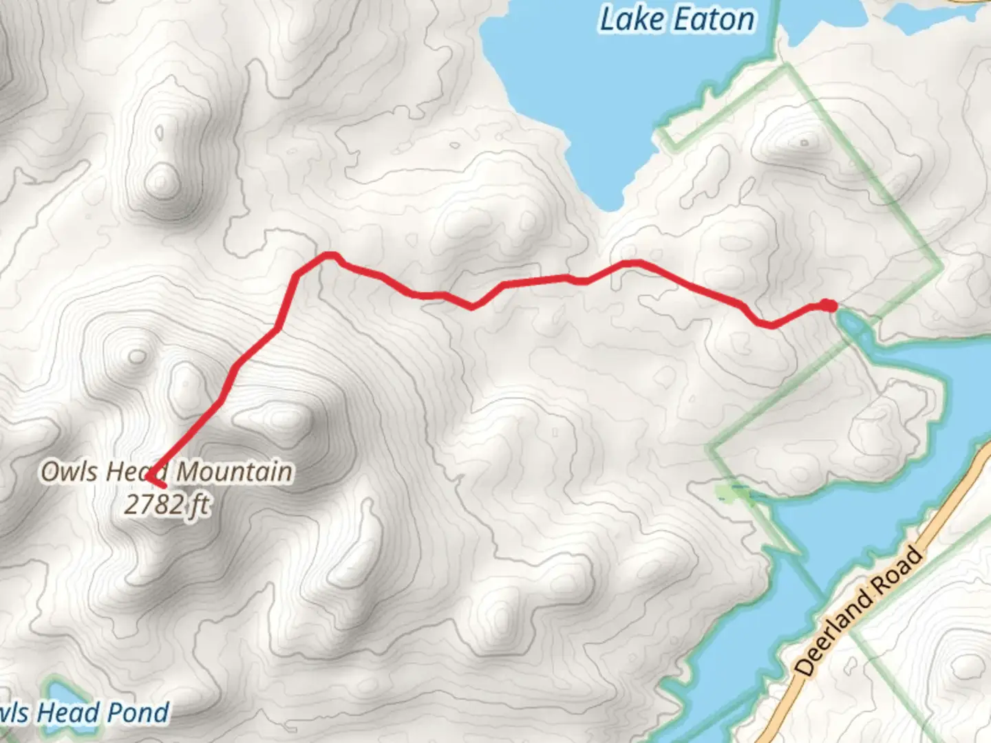 An image depicting the trail Owls Head Mountain Trail and its surrounding area.