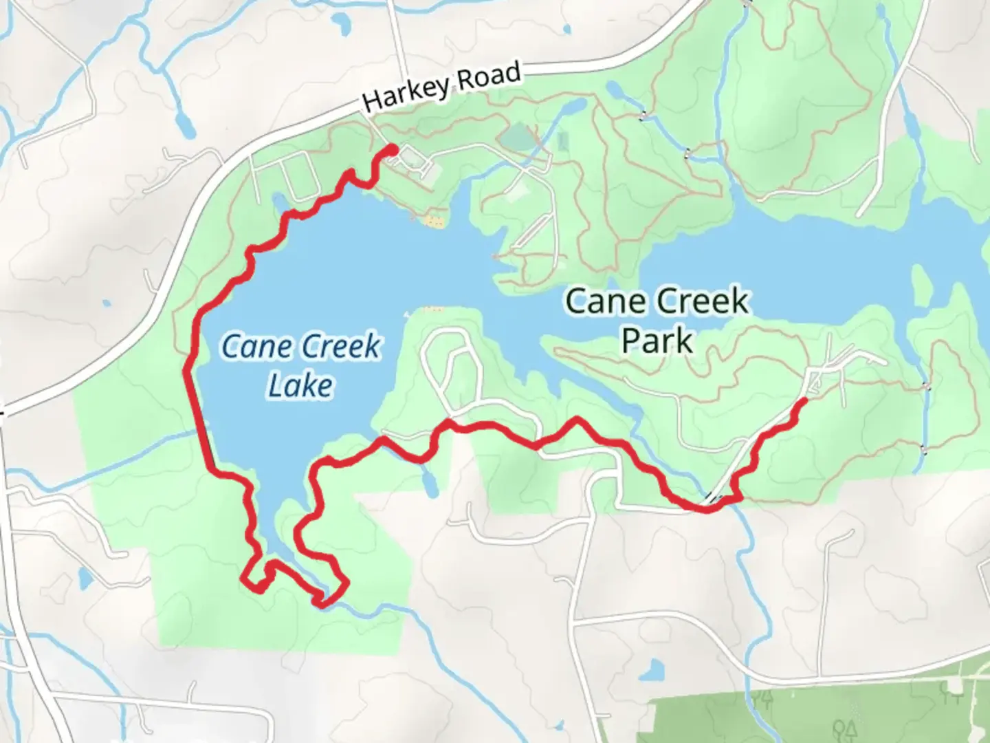 An image depicting the trail Cane Creek Lake Southwest Shore Walk and its surrounding area.