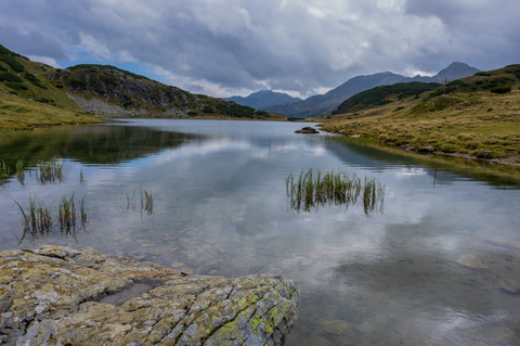 An image depicting the trail Around Steirische Kalkspitze Summit and Lake Oberhüttensee and its surrounding area.