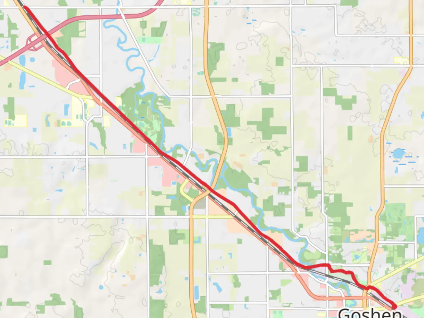An image depicting the trail Maple City Greenway and its surrounding area.