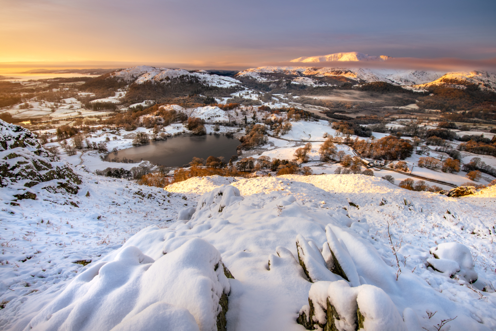 An image depicting the trail Loughrigg Fell and its surrounding area.