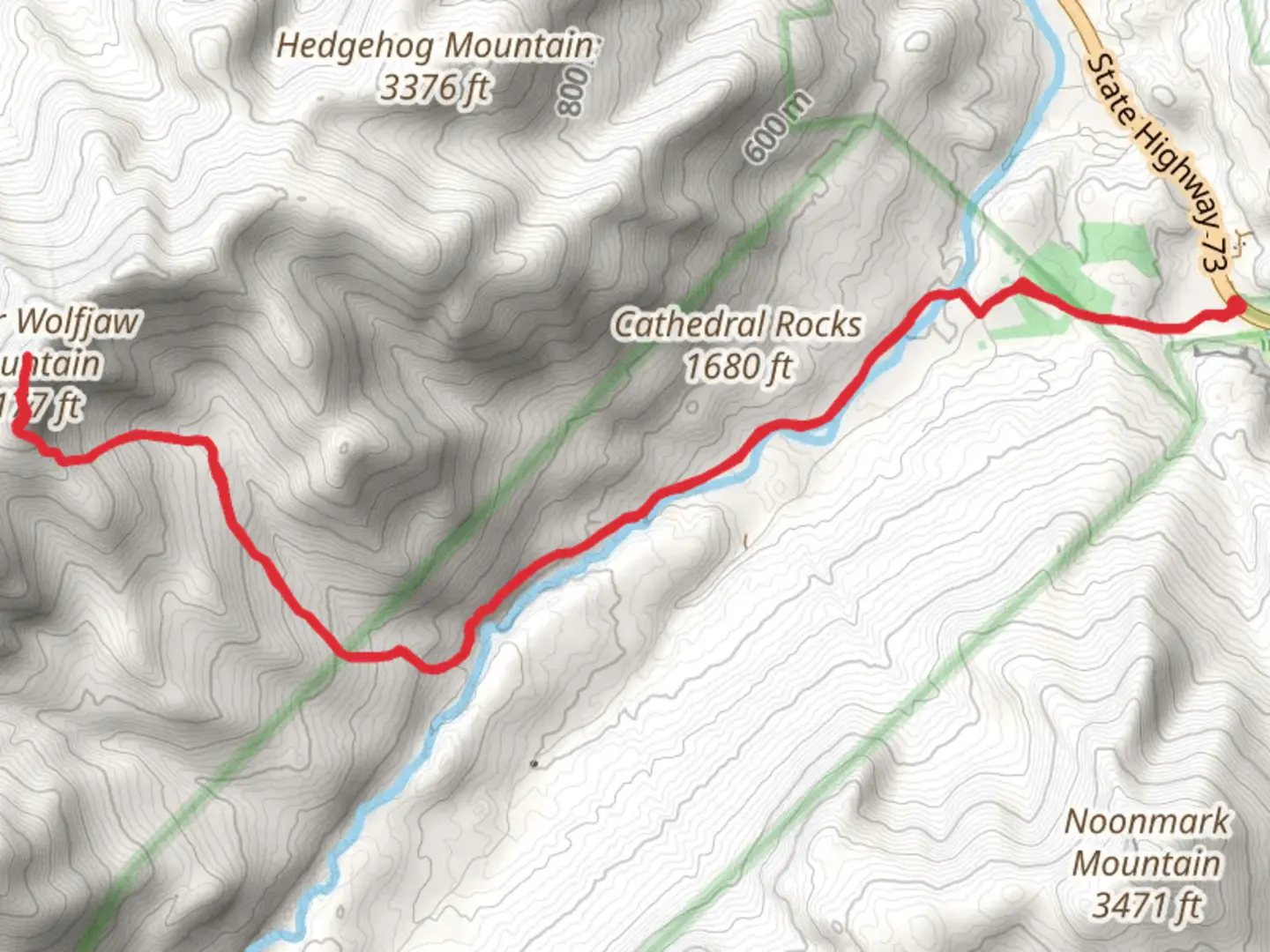 An image depicting the trail Lower Wolfjaw Mountain via West River Trail and its surrounding area.