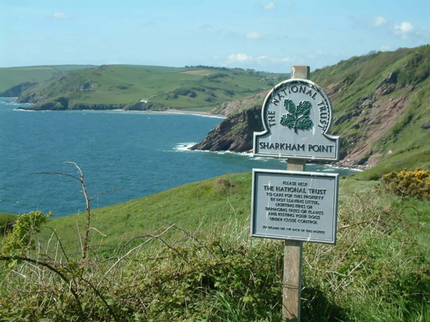 An image depicting the trail Southdown Hill and Sharkham Point National Nature Reserve Loop and its surrounding area.