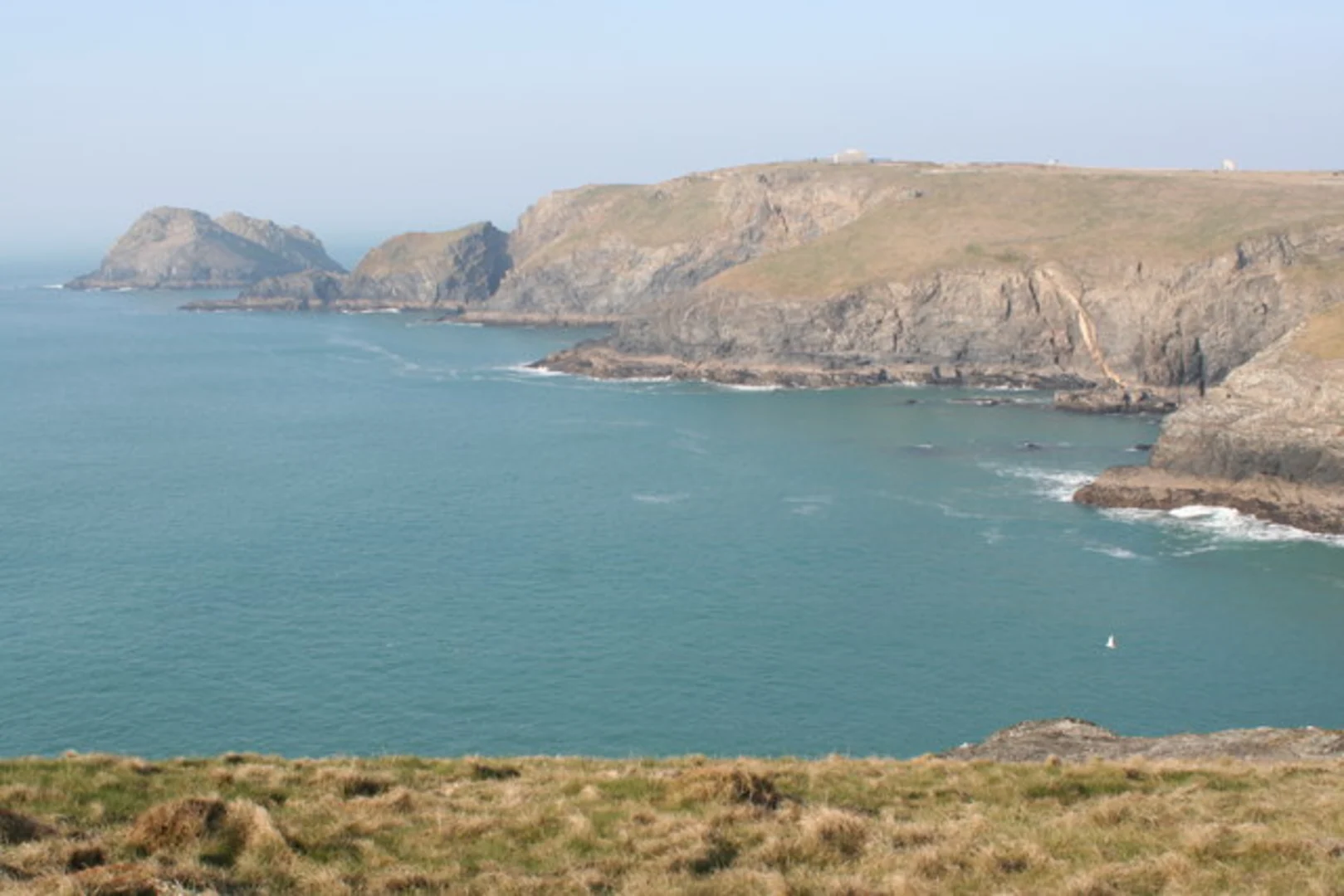 An image depicting the trail Holywell and Perranporth Loop via Perran Beach and its surrounding area.