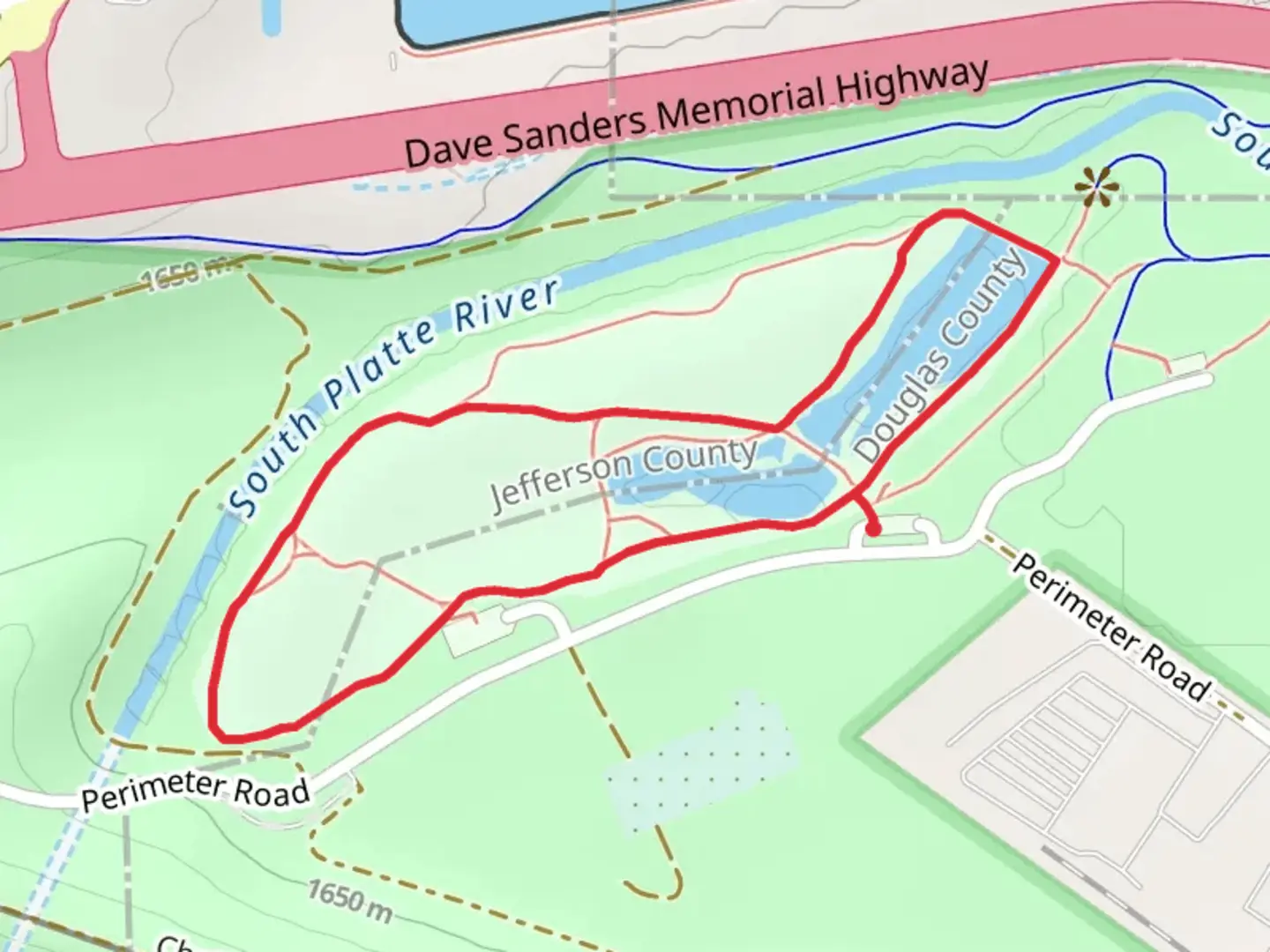 An image depicting the trail Dog Off Leash Area Loop Trail and its surrounding area.