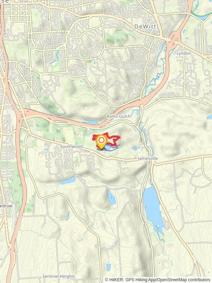 An image depicting the trail Clark Reservation State Park Loop Trail and its surrounding area.