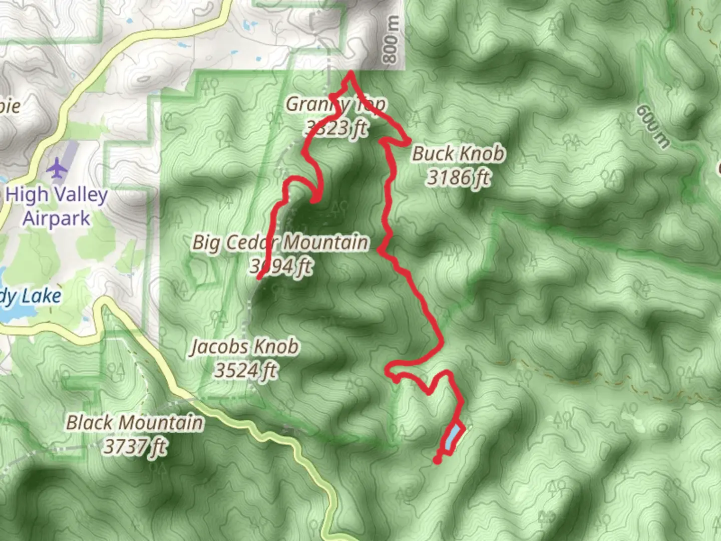 An image depicting the trail Big Cedar Mountain via Dockery Lake and its surrounding area.