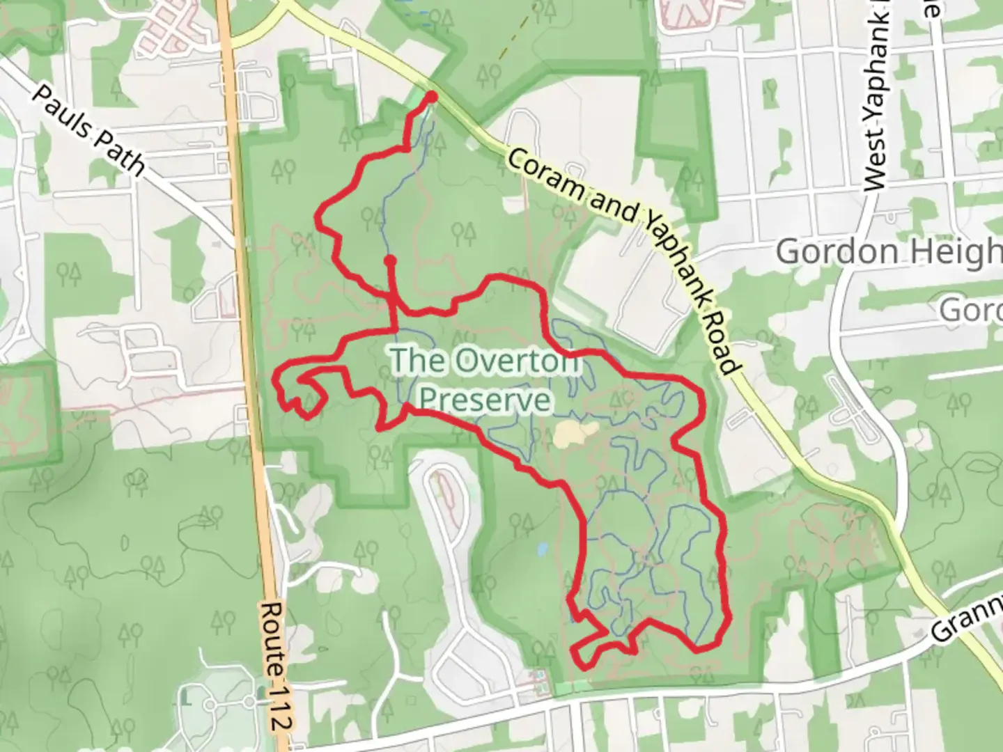 An image depicting the trail Kettles Community Park Loop and its surrounding area.