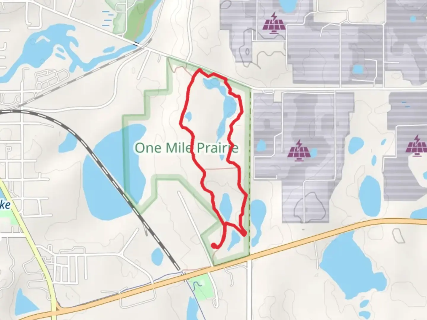 An image depicting the trail One Mile Lake Nature Loop Trail and its surrounding area.