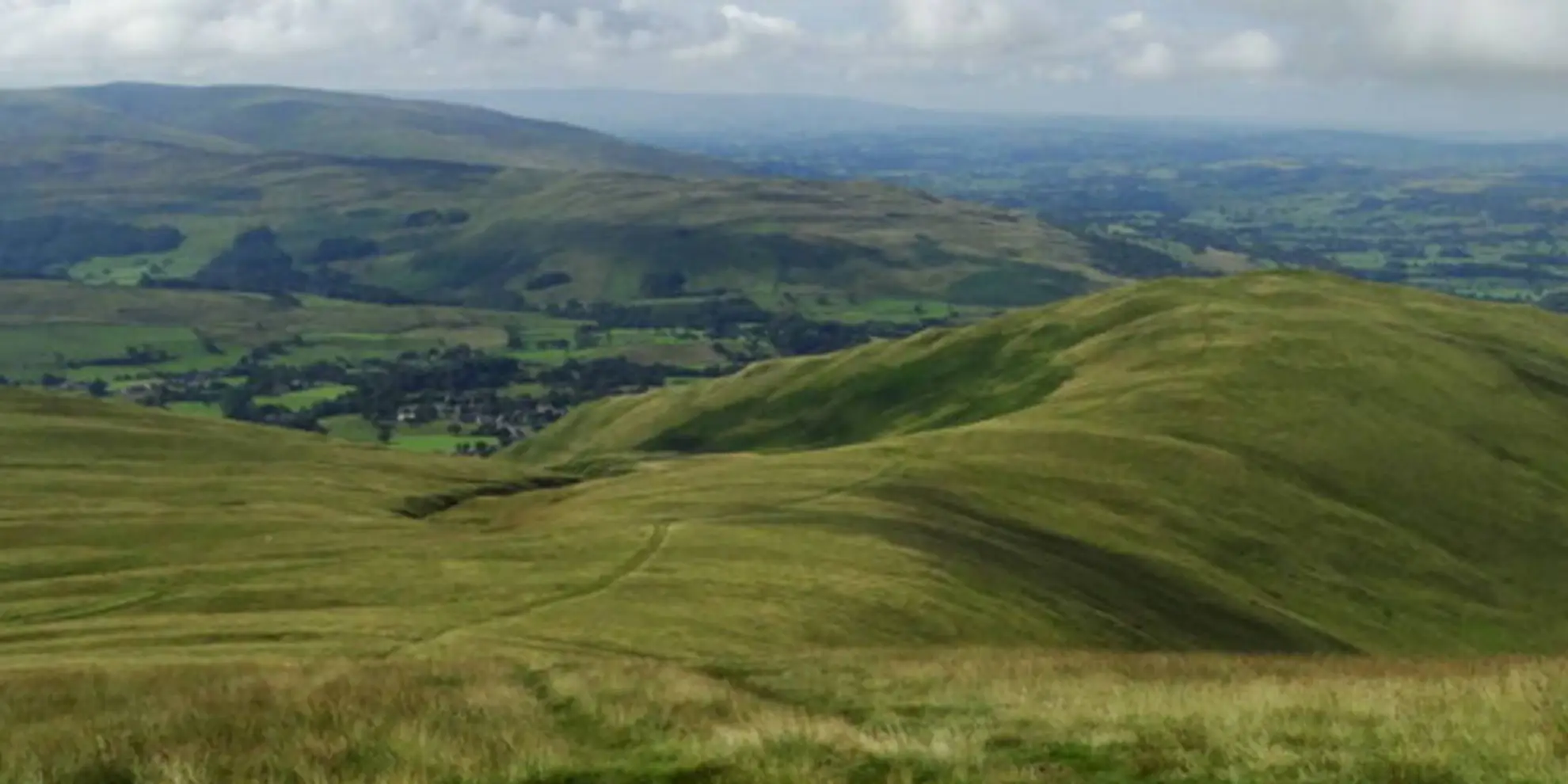 An image depicting the trail Winder and Arant Haw from Sedbergh and its surrounding area.