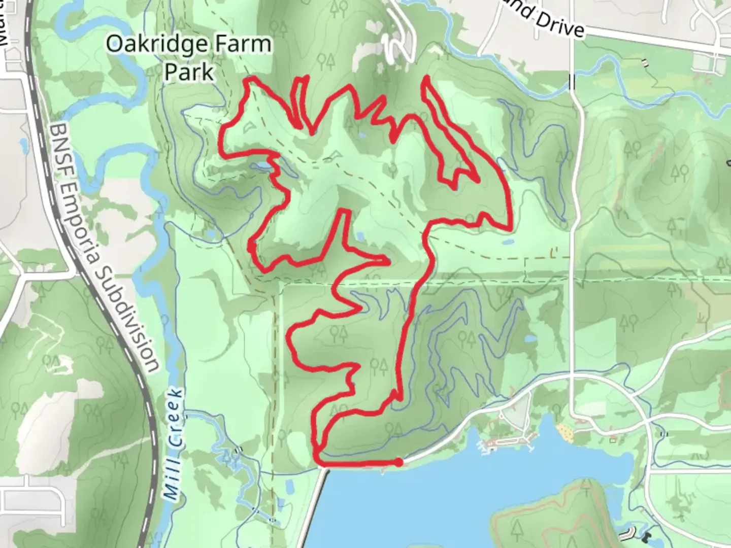An image depicting the trail Oakridge Farm Park - Violet and Red Loop Trail and its surrounding area.