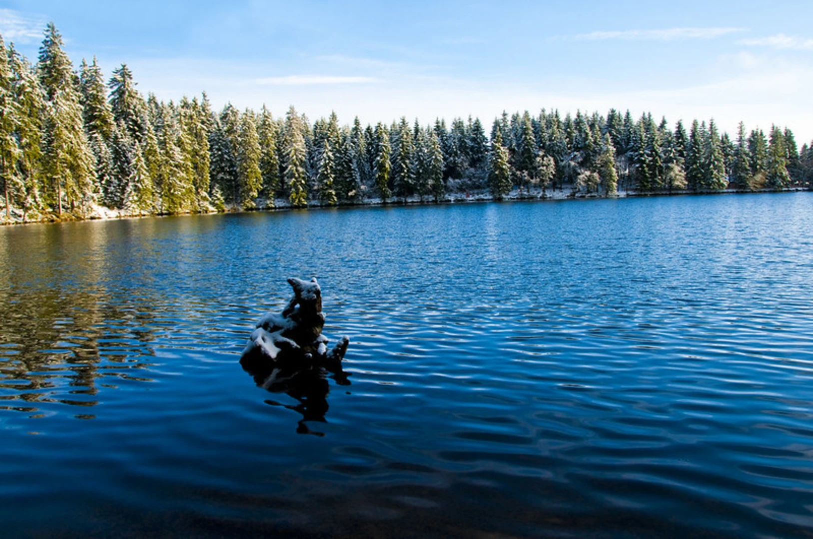 An image depicting the trail Mummelsee and Mummelseeblick, via Brandwegle Untergrinden and its surrounding area.