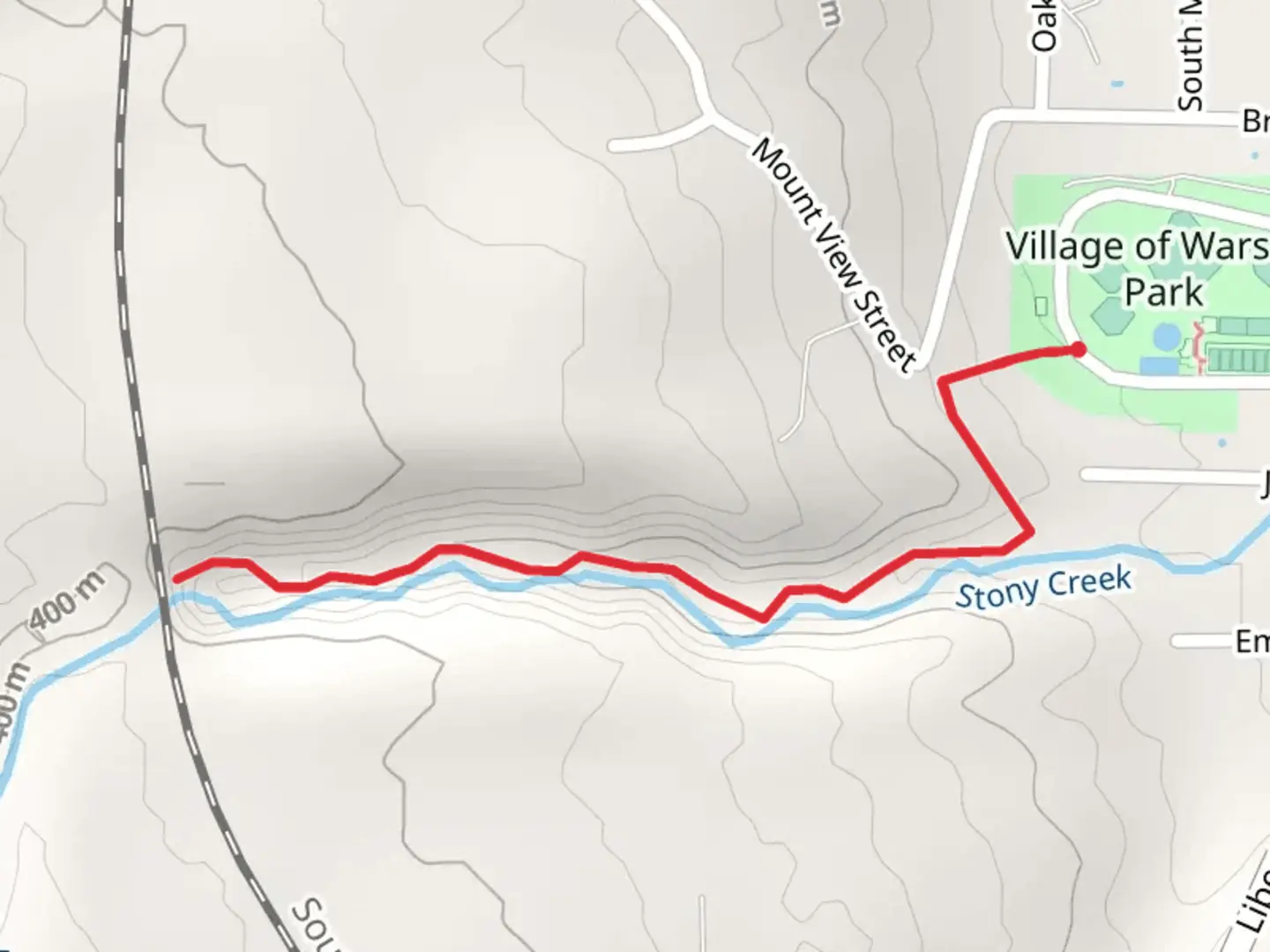 An image depicting the trail Warsaw Waterfall Path and its surrounding area.