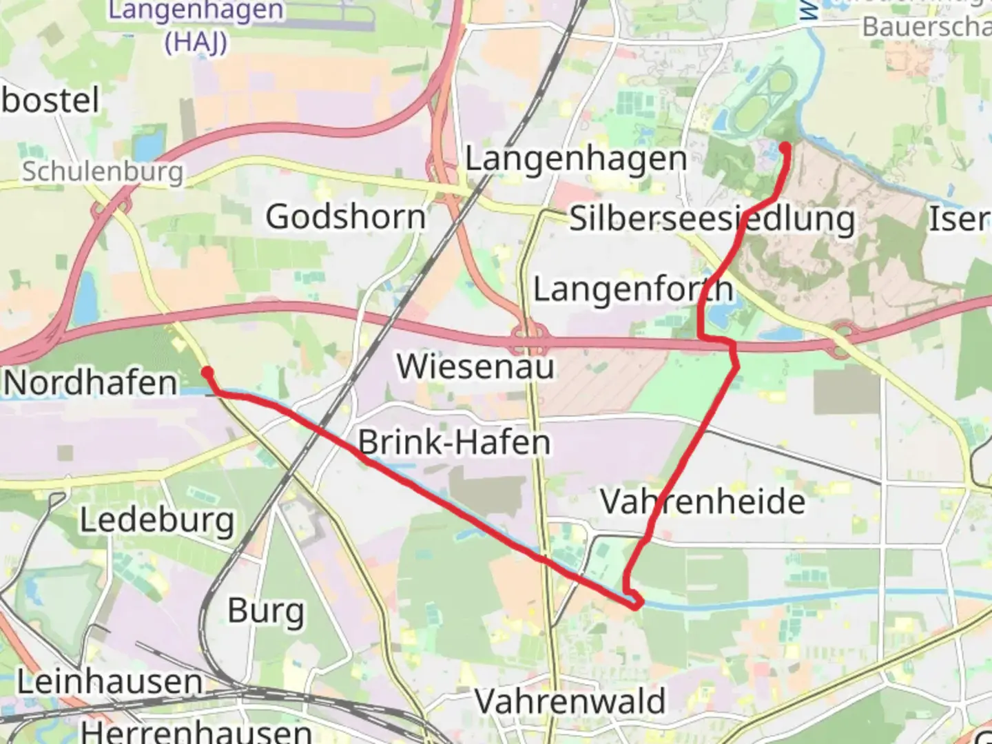 An image depicting the trail Mittellandkanal via Peter Strasser Allee and its surrounding area.