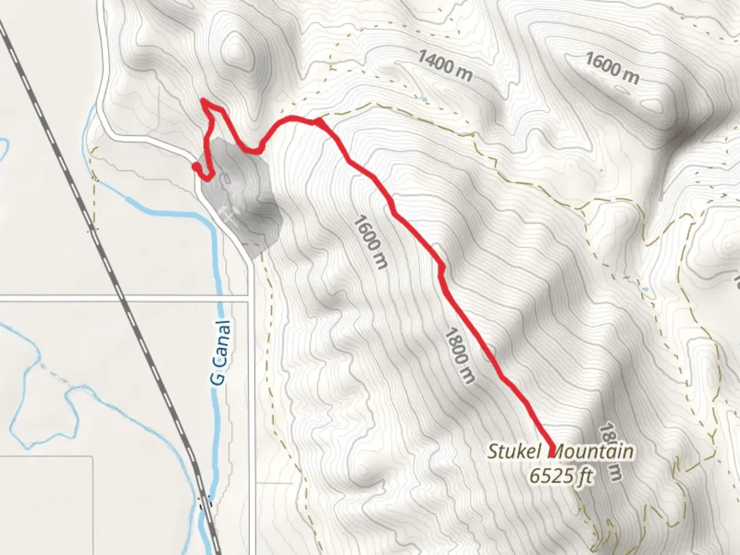 An image depicting the trail Stukel Mountain from Hill Road and its surrounding area.