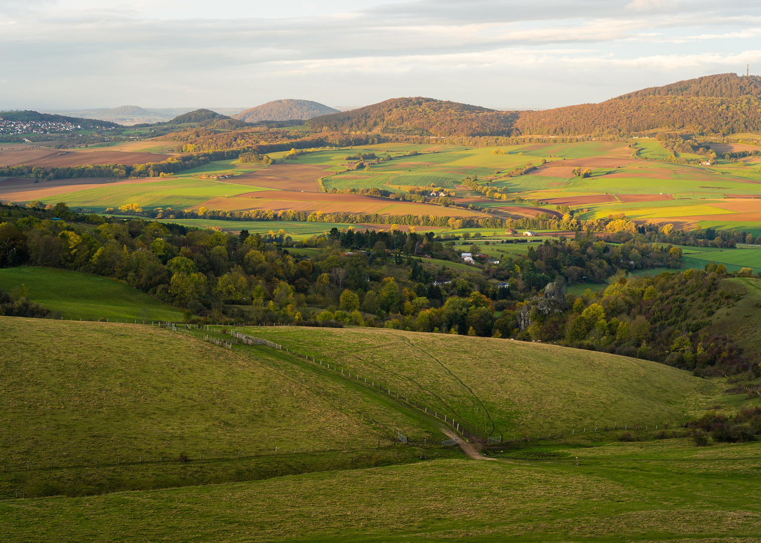 An image depicting the trail Habichtswaldsteig and its surrounding area.