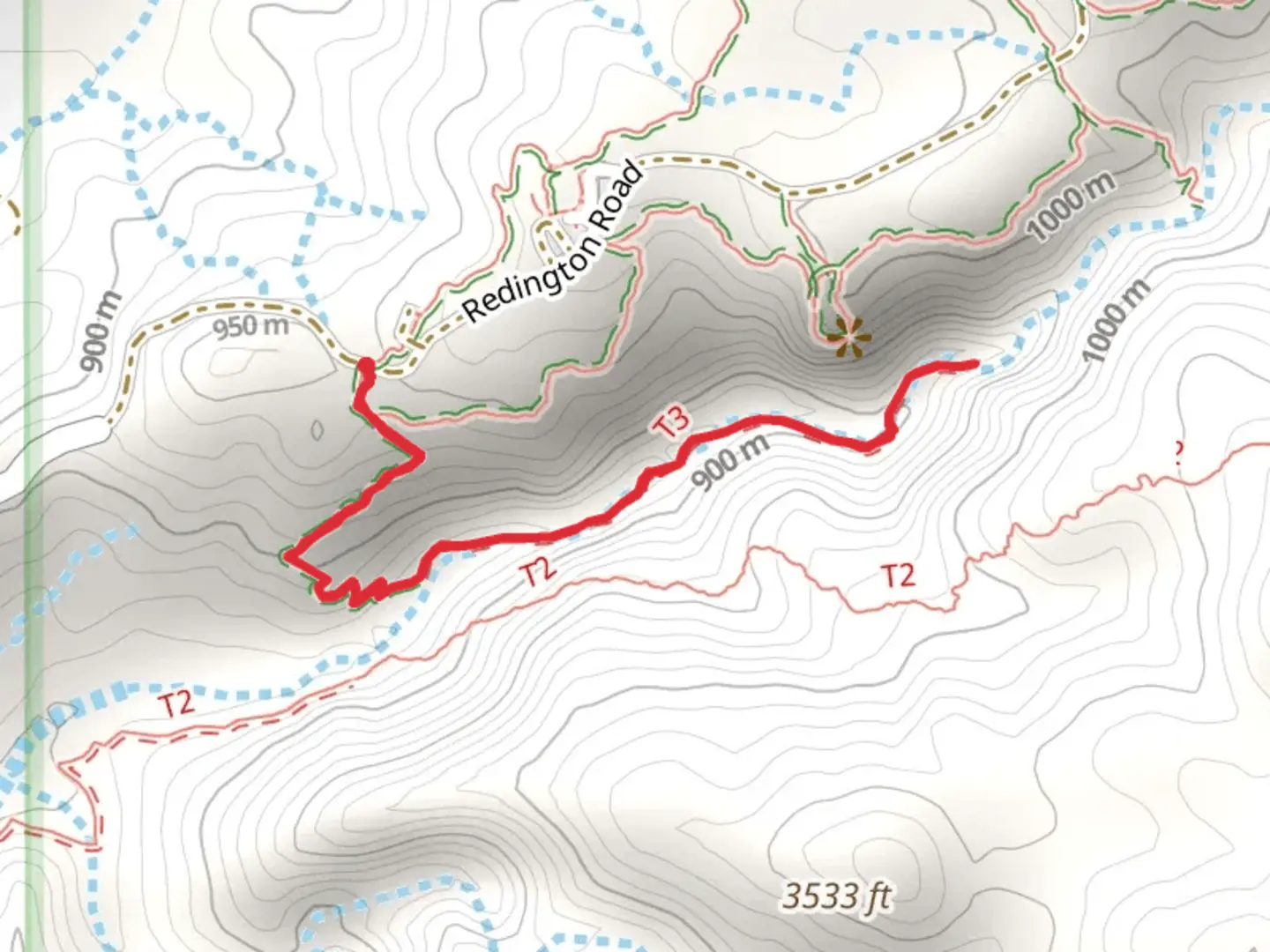 An image depicting the trail Lower Tanque Verde Falls Trail and its surrounding area.