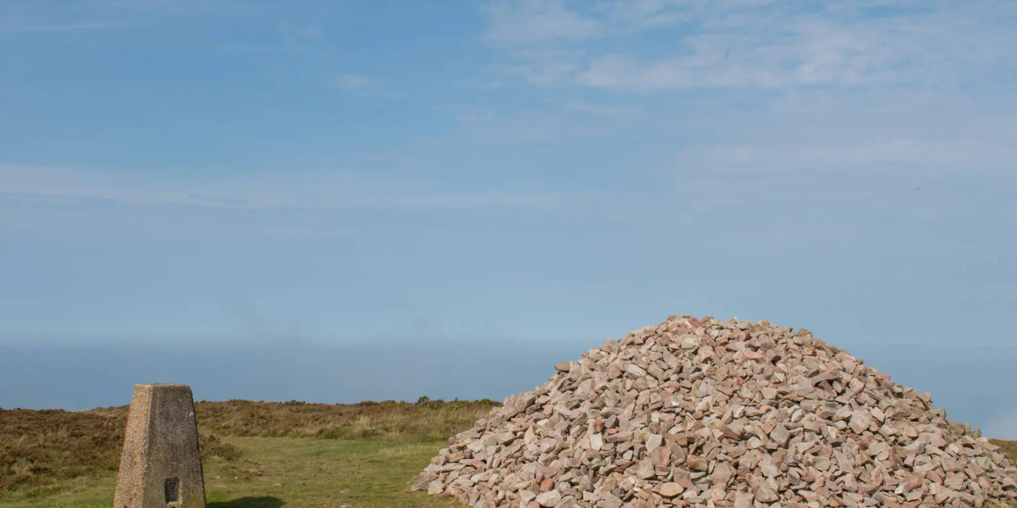 An image depicting the trail Holdstone Down Walk and its surrounding area.