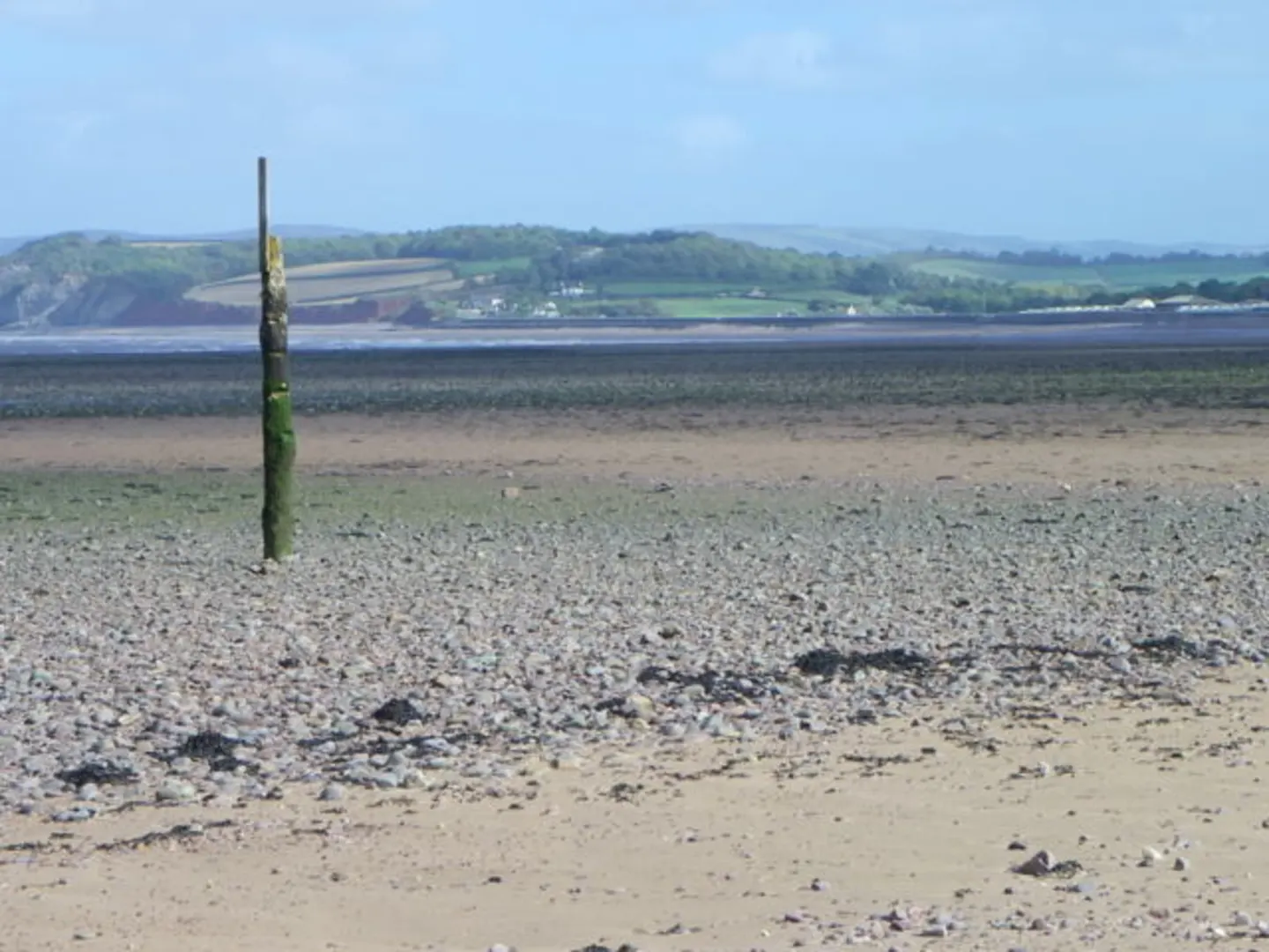 An image depicting the trail Dunster Beach and Warren Point and its surrounding area.