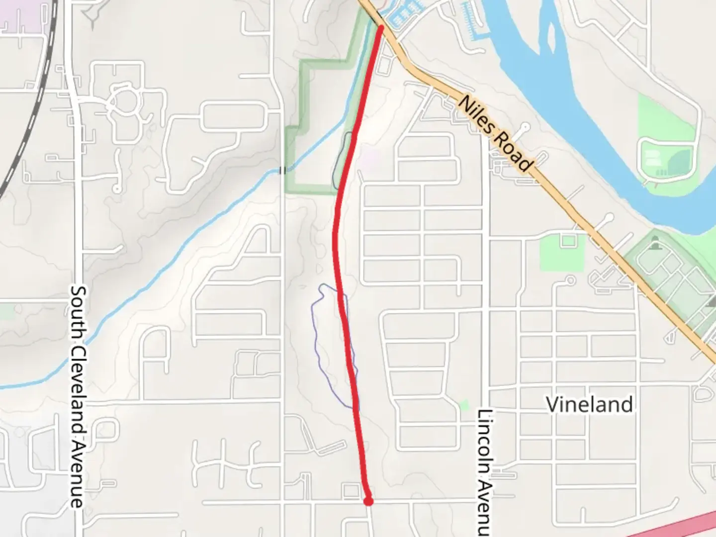 An image depicting the trail Hickory Creek Preserve from Vineland Road and its surrounding area.