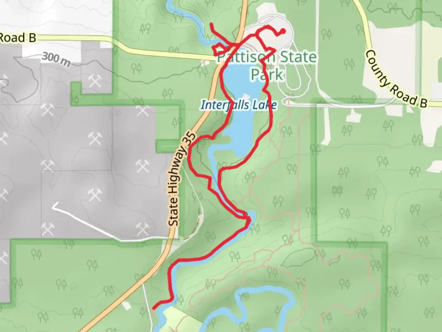 An image depicting the trail Little Manitou Falls and Interfalls Lake via Beaver Loop Trail and its surrounding area.