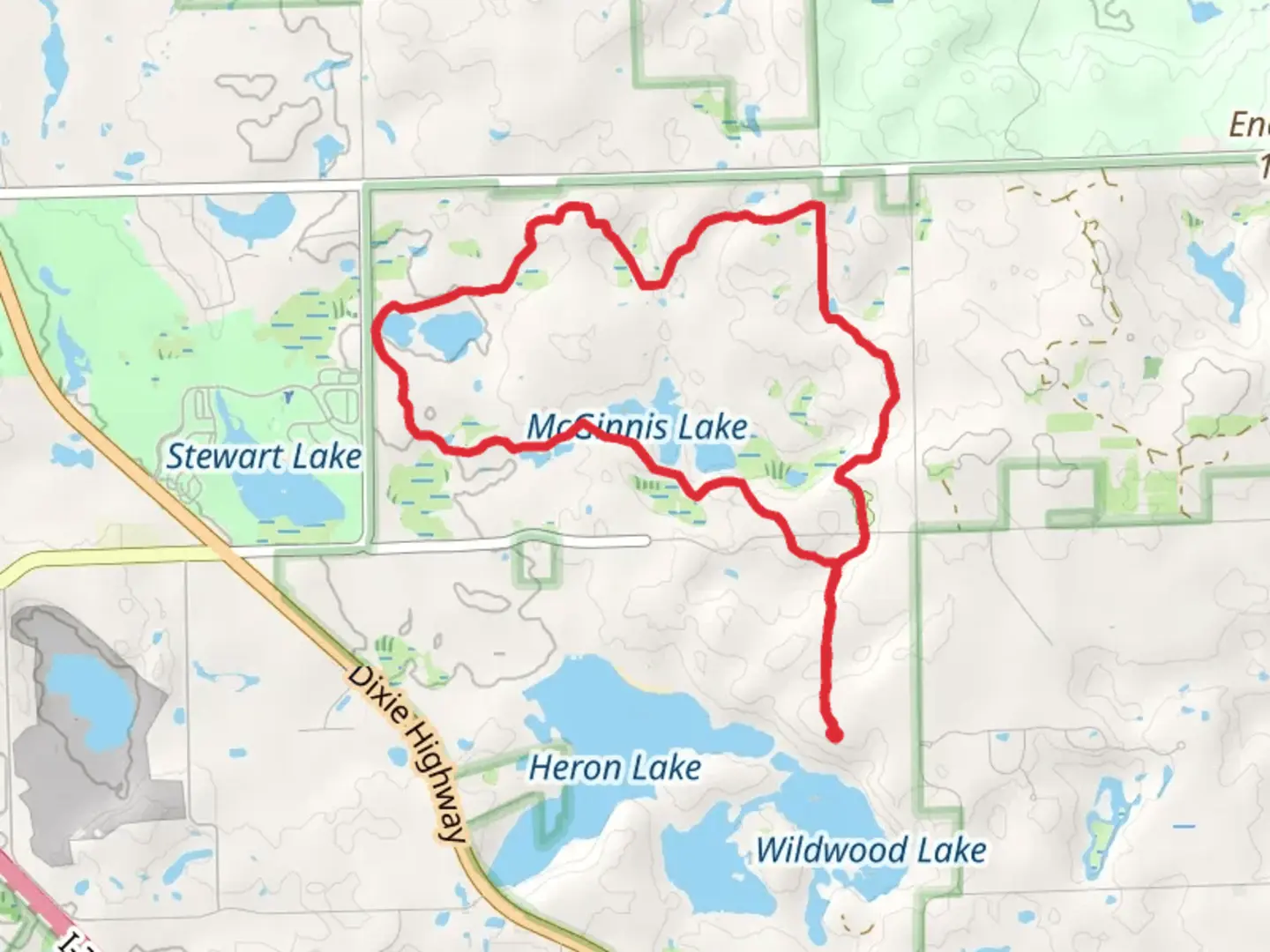 An image depicting the trail Loop around McGinnis Lake and its surrounding area.