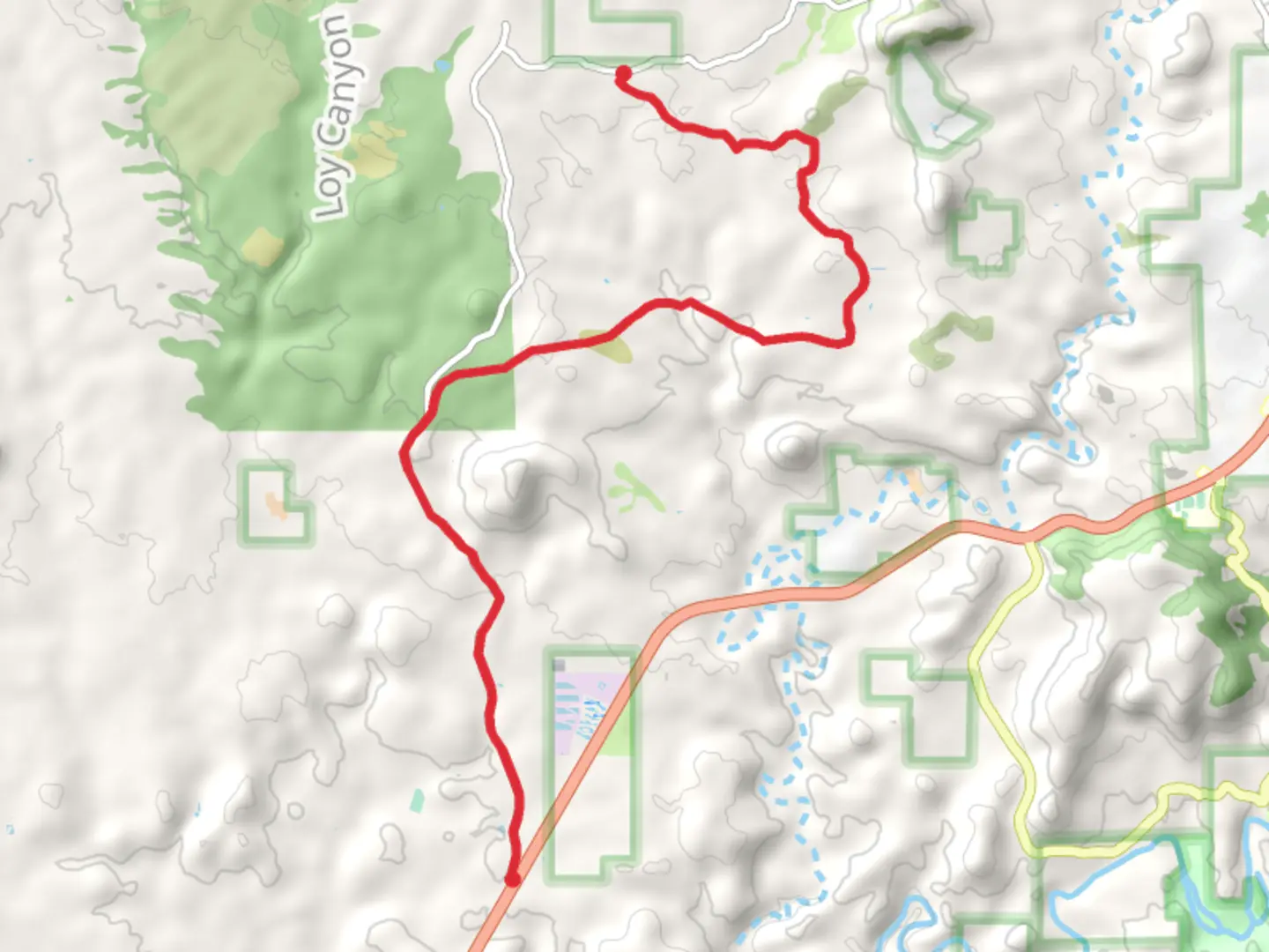 An image depicting the trail Forest Service Road 525 and 152A and its surrounding area.