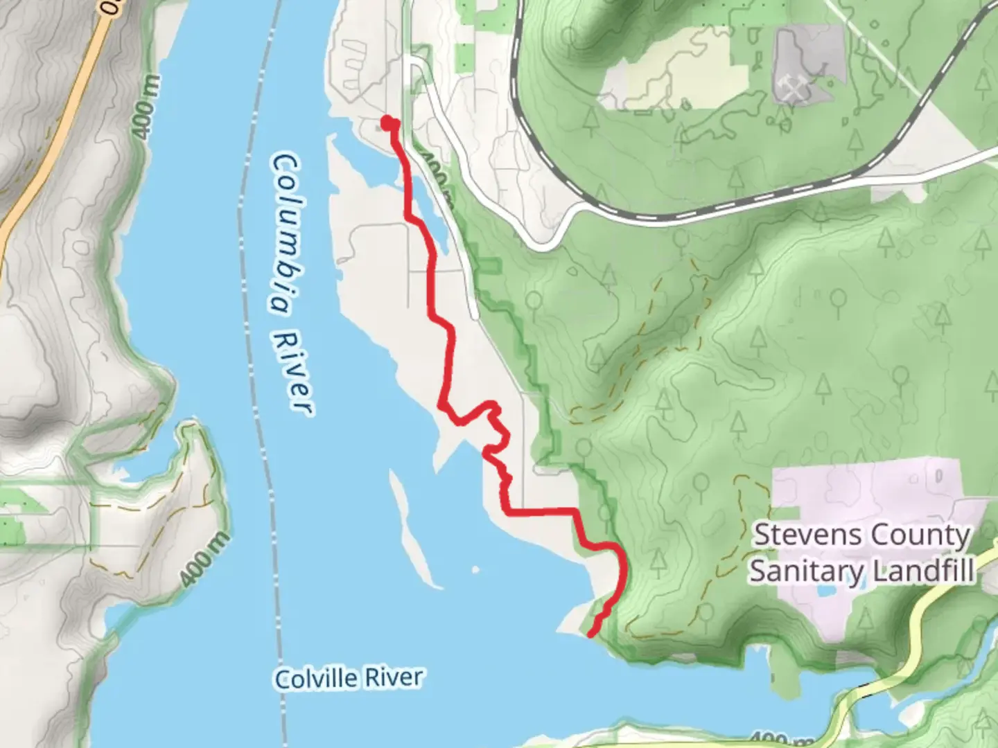 An image depicting the trail Old Kettle Falls recreation Site and Colville River and its surrounding area.