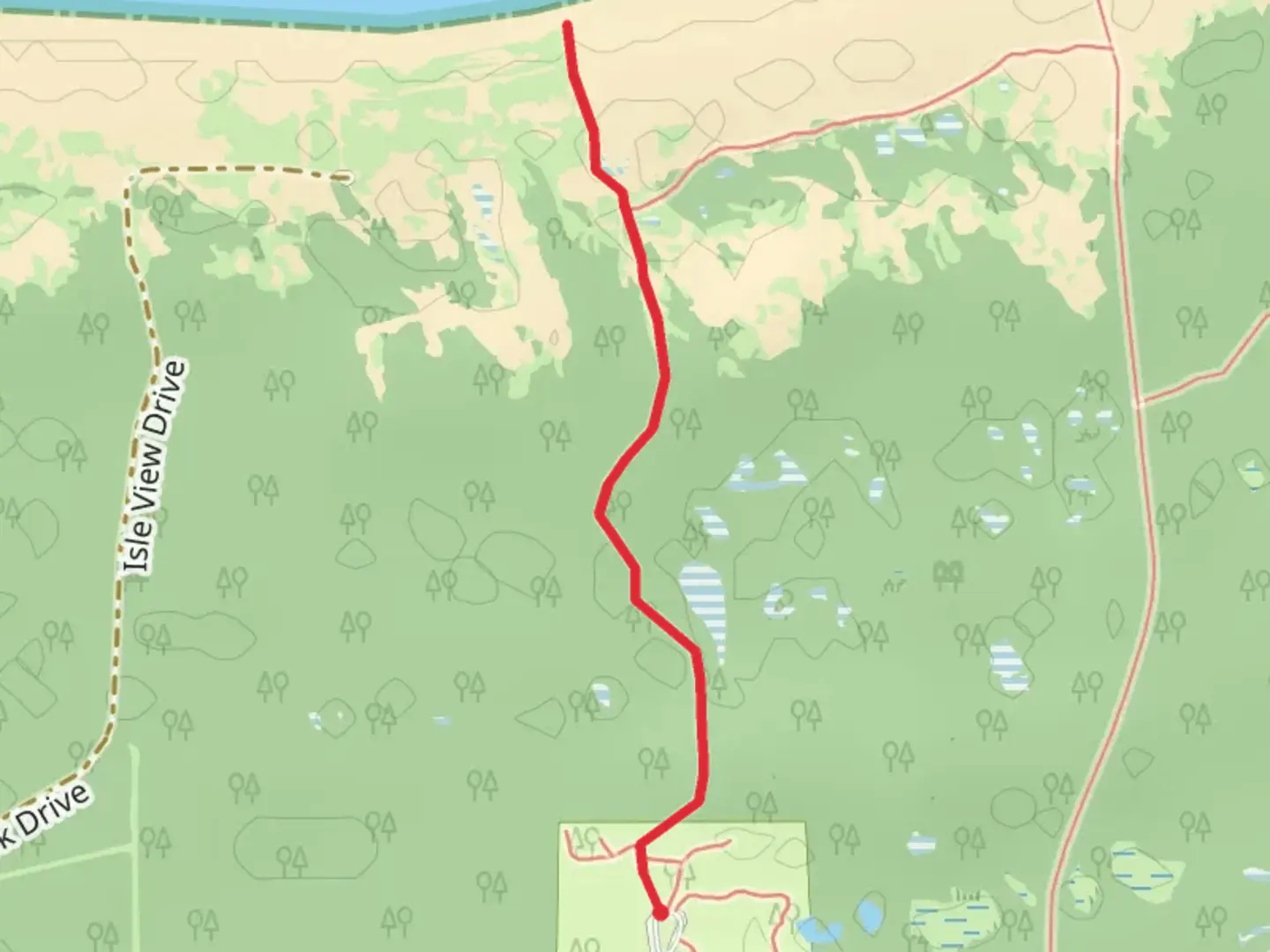 An image depicting the trail Peterson Beach Sleeping Bear Recreation Area and its surrounding area.