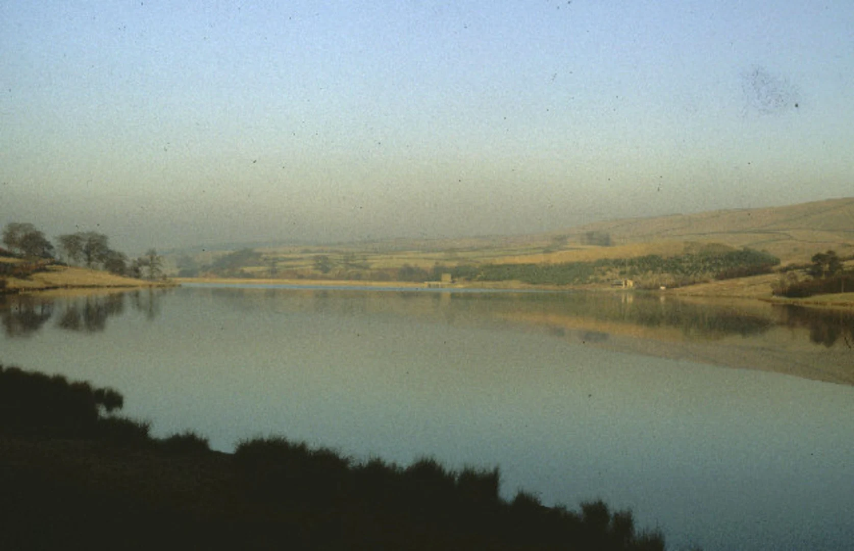 An image depicting the trail Errwood Hill, Cats Tor and Shining Tor Loop - Errwood Reservoir and its surrounding area.