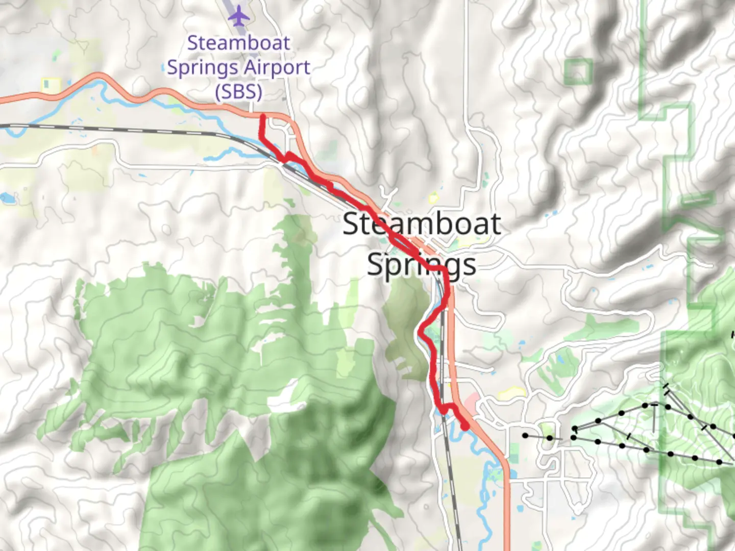 An image depicting the trail Yampa River Core Loop Trail - Mount Werner Road and its surrounding area.