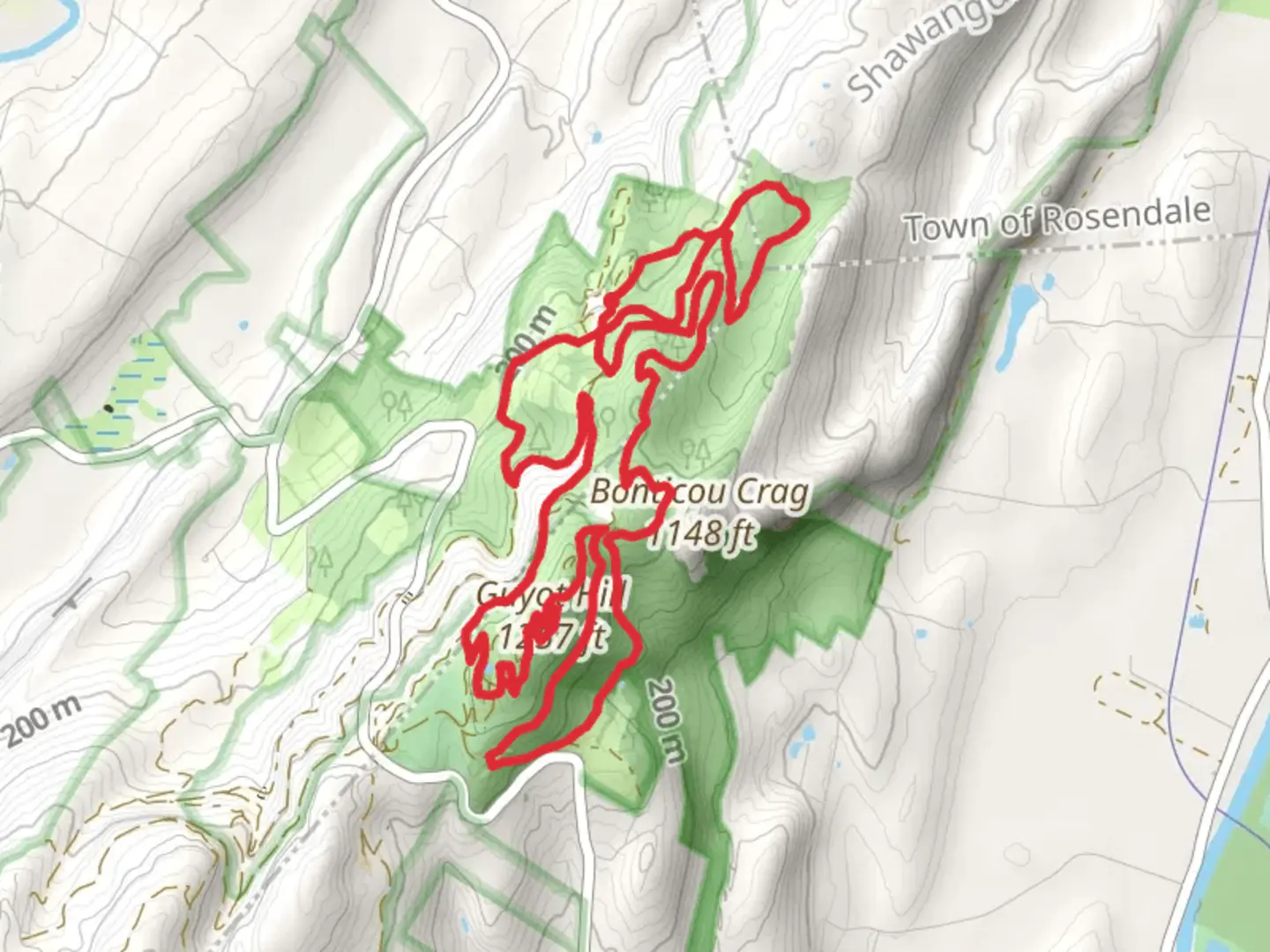 An image depicting the trail Guyot Hill Loop via Cedar Trail and its surrounding area.