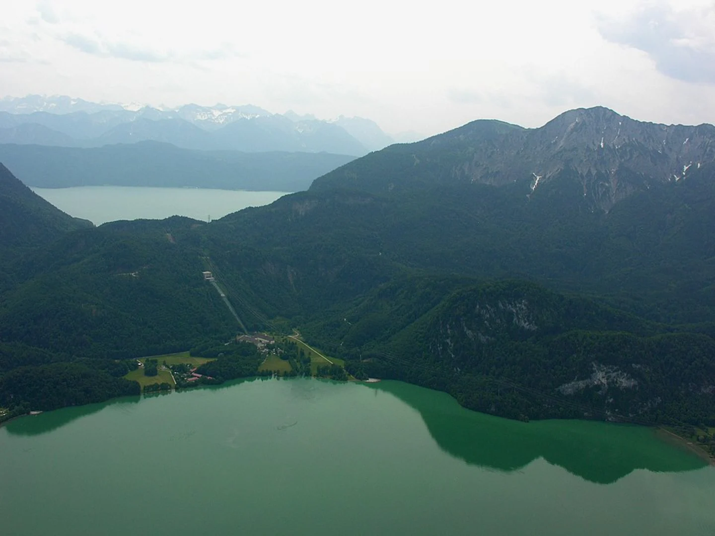 An image depicting the trail Herzogstand Peak via Rauchkopf and its surrounding area.