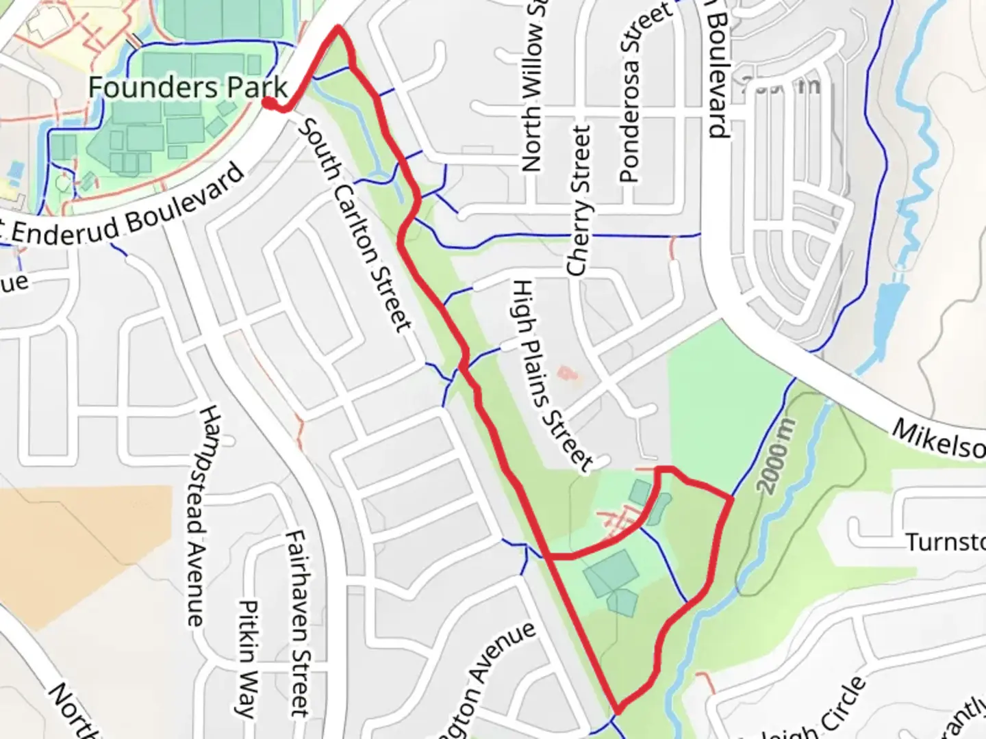 An image depicting the trail Mitchell Creek Powerline Trail and its surrounding area.