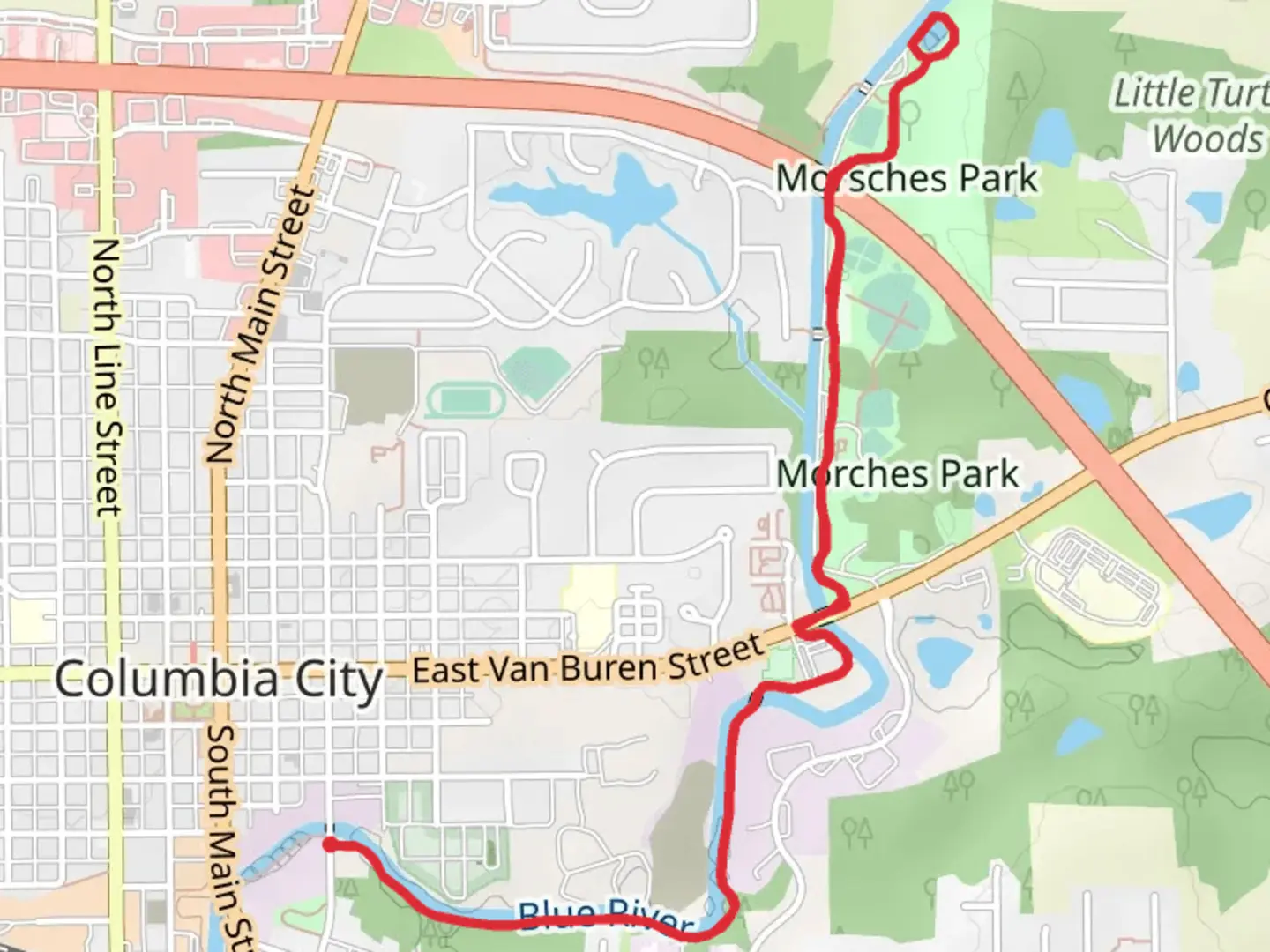 An image depicting the trail Morsche Park Pond Loop via Blue River and its surrounding area.