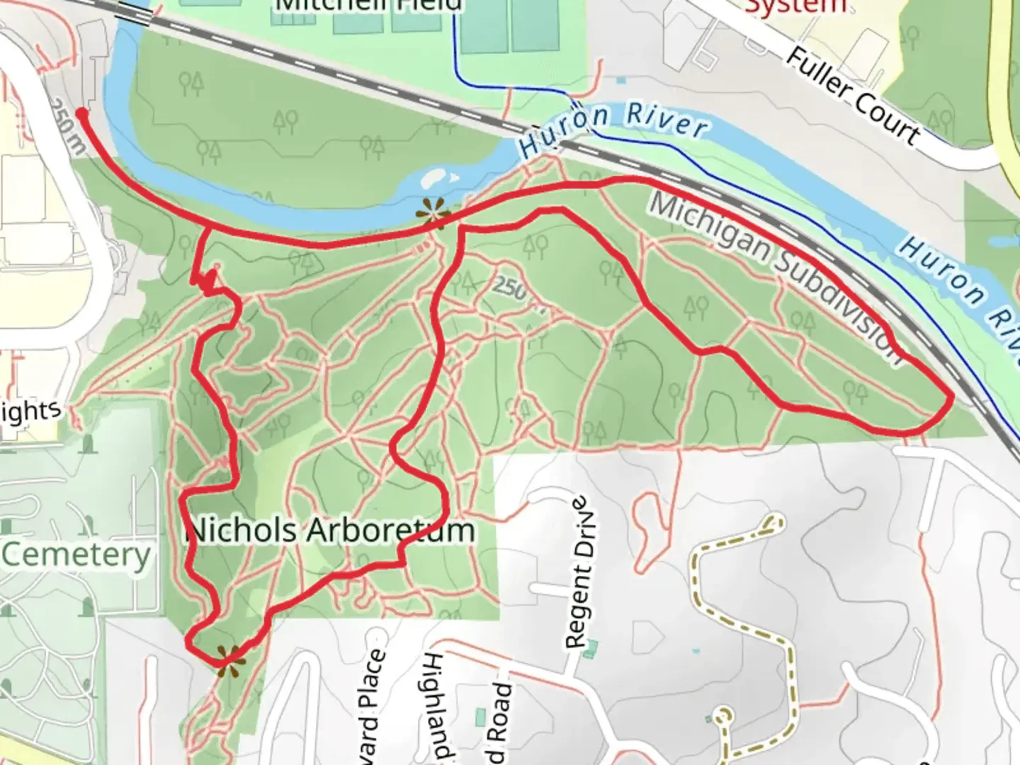 An image depicting the trail Nichols Arboretum Loop and its surrounding area.