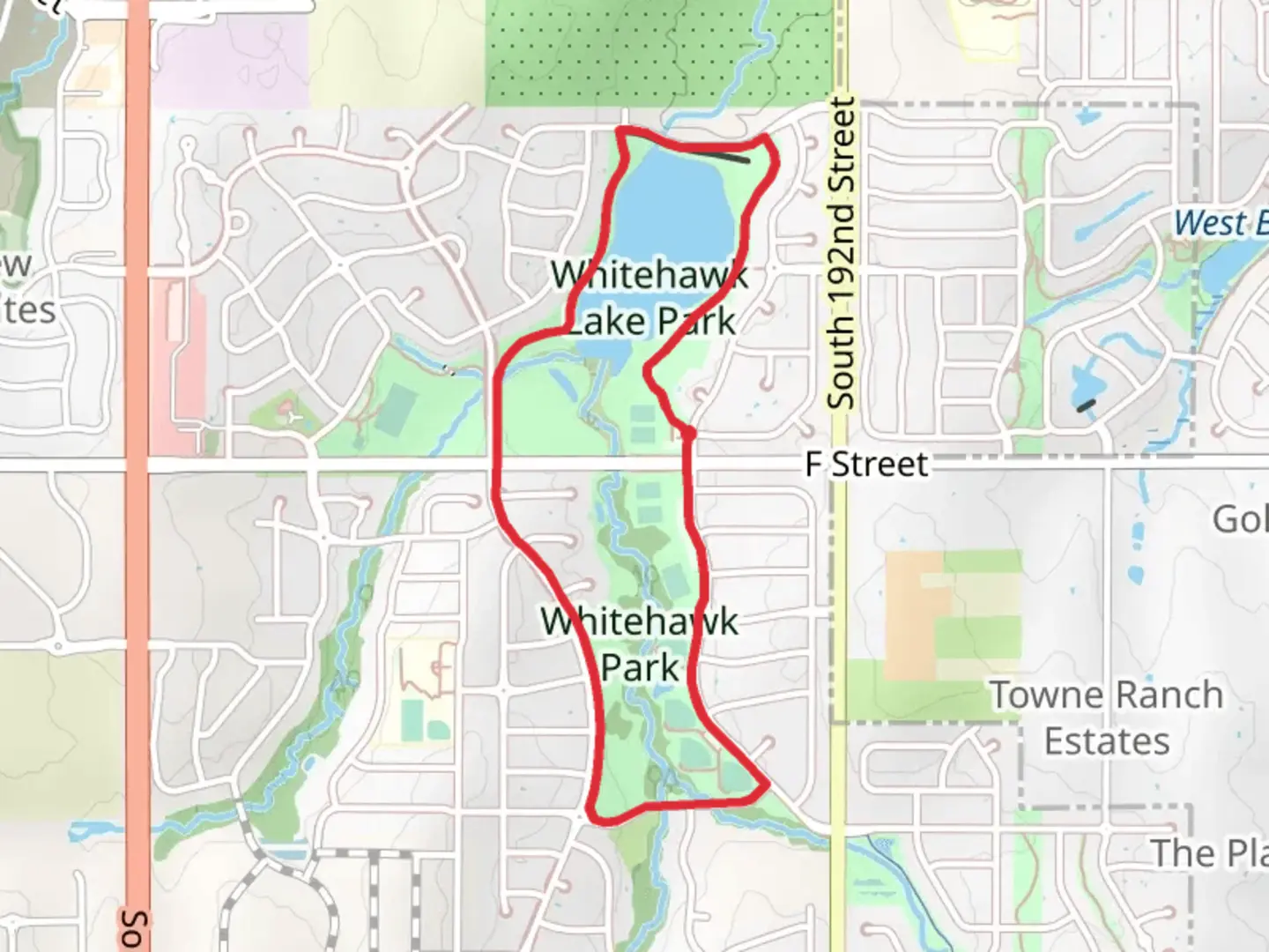 An image depicting the trail Whitehawk Park and Lake Loop and its surrounding area.