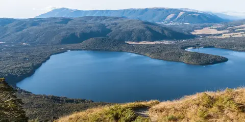An image depicting the trail Lake Rotoiti - West Bay - Black Hill Walk and its surrounding area.