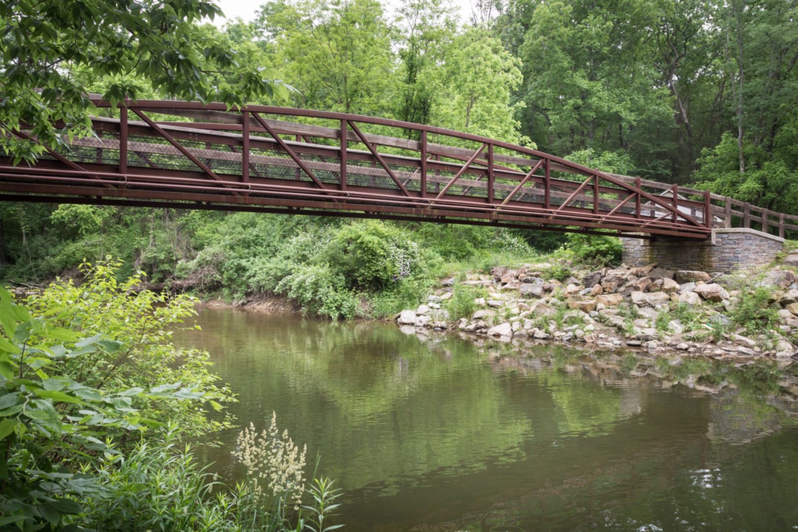 An image depicting the trail Bushkill Creek via Jacobsburg State Park and its surrounding area.
